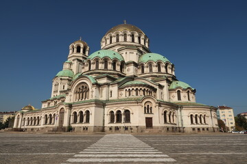 Fototapeta na wymiar View onto the St. Alexander Nevsky Cathedral in Sofia with crosswalk in front
