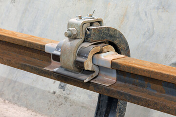 Close-up metro third rail holder