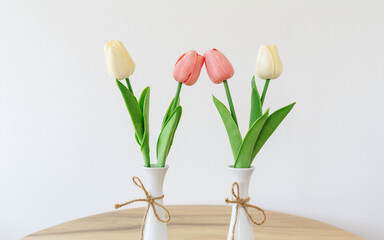Tulips flowers  in a white vase