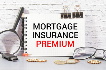 Mortgage Insurance Premium MIP with stack of documents.