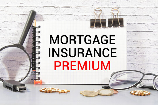 Mortgage Insurance Premium MIP with stack of documents.