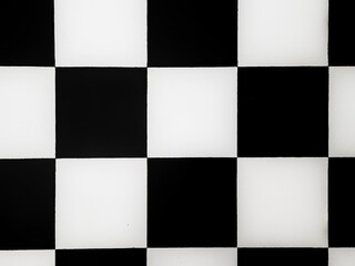 finish flag.  chessboard.  box box.  black and white and Balinese cloth motif