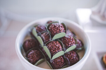 clean decoration and fine sweets for intantil baptism