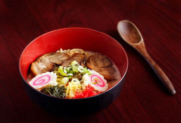  Kyushu ramen bowl with wooden spoon; copy space