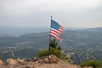 Los Angeles, California, USA - April 11, 2022: Sweeping view of Los Angeles and American flag from...