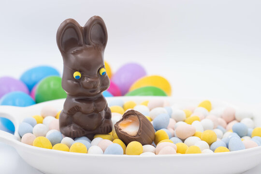 Chocolate Bunny With Cadbury Creme Egg On Top Of Candy Eggs