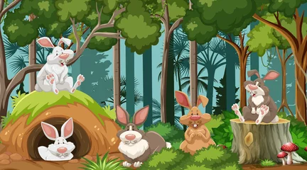 Group of rabbits in nature forest scene © blueringmedia