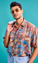 Looks from the 80s are making a comeback in fashion. Cropped shot of a handsome young man styled in...