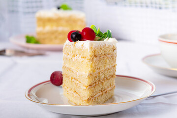 Slice of homemade cake. Sponge cake piece.