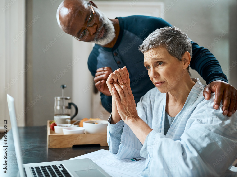 Poster I know its stressful but Im here for you. Shot of a senior married couple stressed out doing their budget at home.