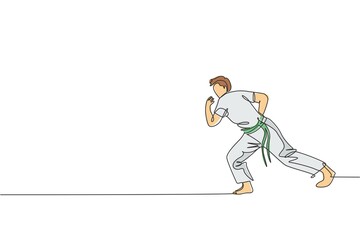 Fototapeta premium One continuous line drawing of young sporty Brazilian fighter man training capoeira on the beach. Healthy traditional fighting sport concept. Dynamic single line draw design vector illustration