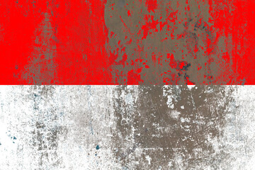 Indonesia flag painted on a damaged old concrete wall surface