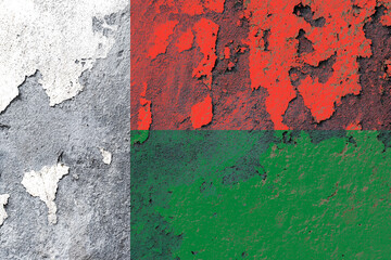 Madagascar flag painted on a damaged old wall surface