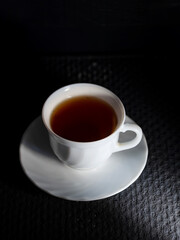 minimalistic white porcelain teapot and cups for tea drinking for two