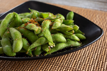 A view of a plate of edamame.