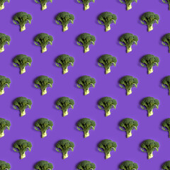 Seamless pattern with fresh broccoli on purple background.