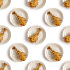 Seamless pattern with roasted chicken leg on white background.