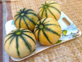 Beautiful melons inside the plate