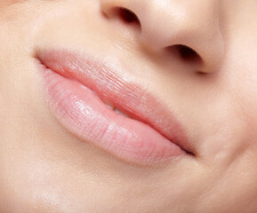 Closeup macro portrait of young female part of face with no makeup.