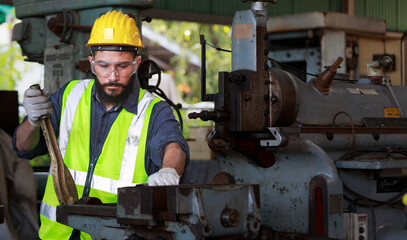 Portrait of a male engineer, professional, skilled labor, quality skills, inspecting and...
