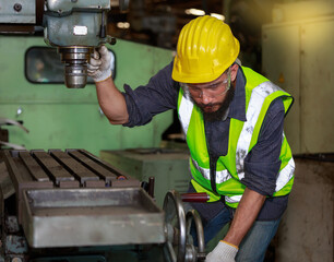 Portrait of a male engineer, professional, skilled labor, quality skills, inspecting and controlling machines.