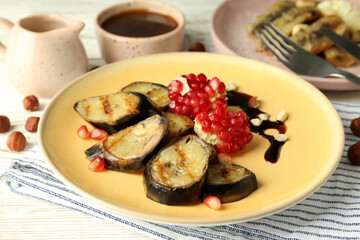 Concept of tasty dessert with grilled banana, close up