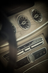 Modern luxury car air vents detail.