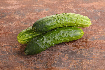 Fersh juicy green cucumbers heap