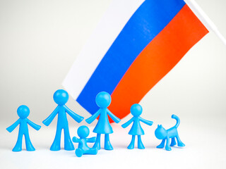 Blue men of different sexes on a light background with the flag of Russia. Concept of Traditional Values, Family