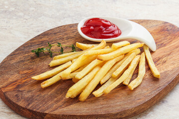 French fried potato over board