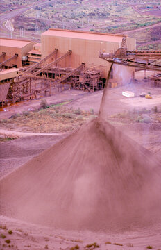 Iron ore mining stock pile in the Pilbara region of Western Australia .