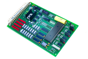 Computer board with soldered microcircuits and semiconductors on a white background.