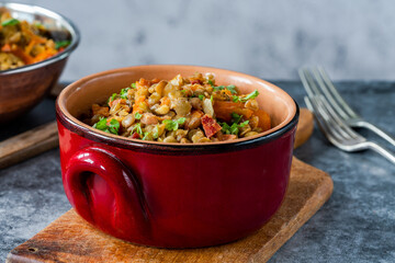 Green lentils stew with white wine, Serrano ham and smoked paprika