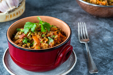 Green lentils stew with white wine, Serrano ham and smoked paprika