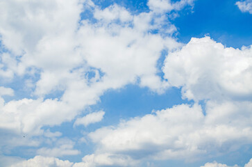Naklejka na ściany i meble Sunny day abstract cloud and blue sky background texture.