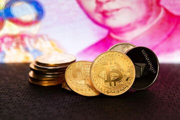 Chinese money and bitcoin in the background