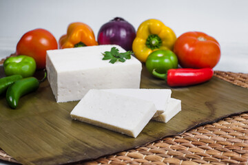 Mexican white panela cheese with fresh ingredients in Mexico Latin America	