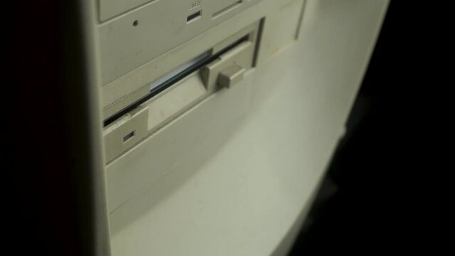 Top Secret Classified Documents on Floppy Disk, Placing Into PC Computer Drive, Close Up