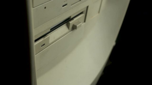 DOS Operating System on Floppy Disk, Inserting in PC Drive, Close Up