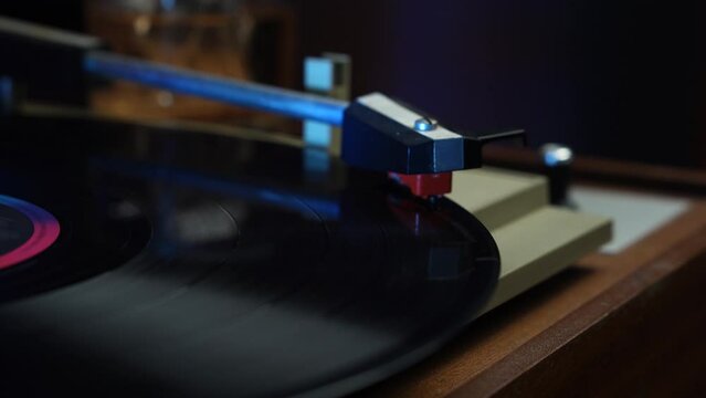 Starting Vintage Gramophone and Placing Needle on Long Play Vinyl Record, Close Up