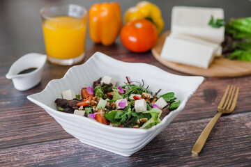 mexican salad bowl with panela white cheese and ingredients in Mexico