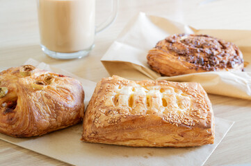 a few puff pastry buns with coffee