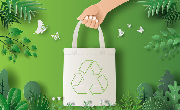Recycle banner design, hand holding eco bag, save the planet and energy concept, paper illustration.
