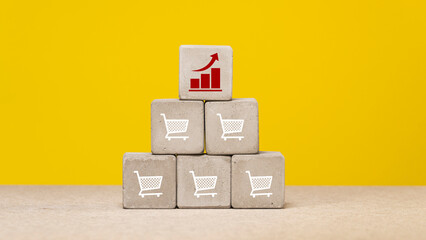 Concrete cubes depicting baskets. Online marketing concept. Symbol for online or offline shopping. copy space.