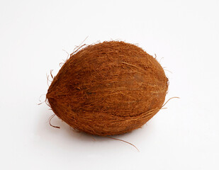 Peeled coconut fruit isolated on white background.