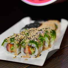 Bright sushi on a dark background