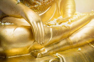 Bathing the buddha statue and sacred things during songkran festival or thai traditional new year.