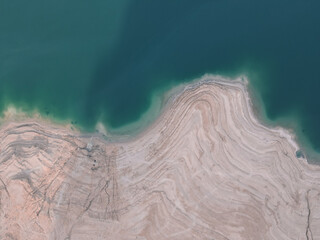 Aerial shoot of Abandoned Salty shore of Dead Sea Seascape, Nature background. Israel