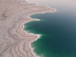 Aerial shoot of Abandoned Salty shore of Dead Sea Seascape, Nature background. Israel