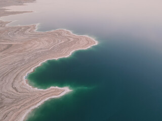 Aerial shoot of Abandoned Salty shore of Dead Sea Seascape, Nature background. Israel
